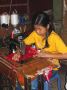 Cambodian Girl Sewing