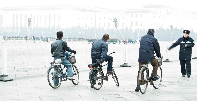 Bicyclists in Beijing at the Lowering of the Flag, Tiananmen Square